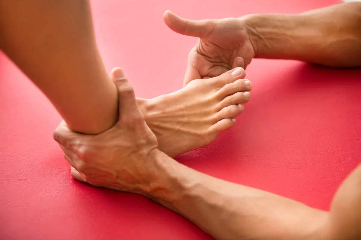 Osteopath Assessing A Hallux Valgus