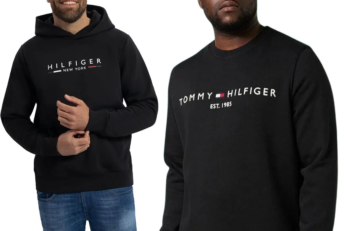 Deux hommes portant des pulls noirs à capuche et col rond Tommy Hilfiger.